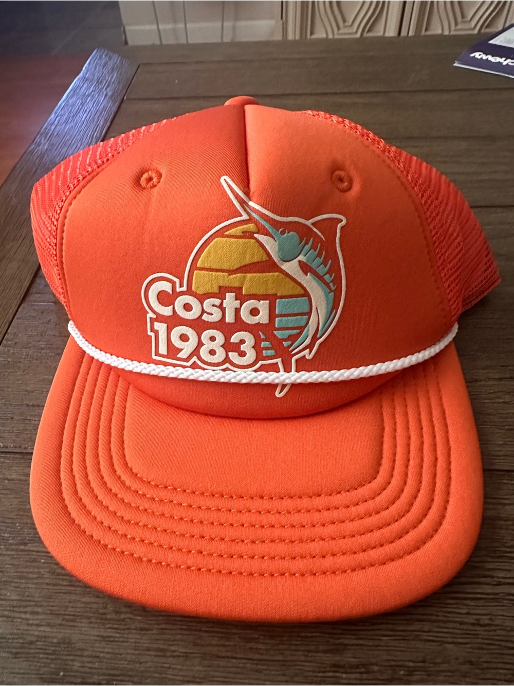 Costa Trucker Hat in Bright Orange with Teal Accent